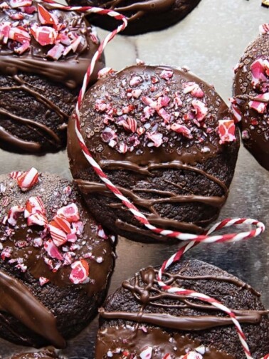 close up of chocolate cookies with crushed candy cane