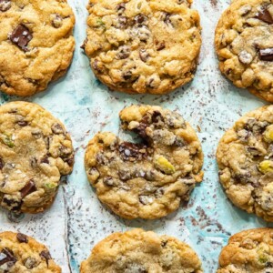 Top down shot of chocolate chip cookies laid out on a baking sheet