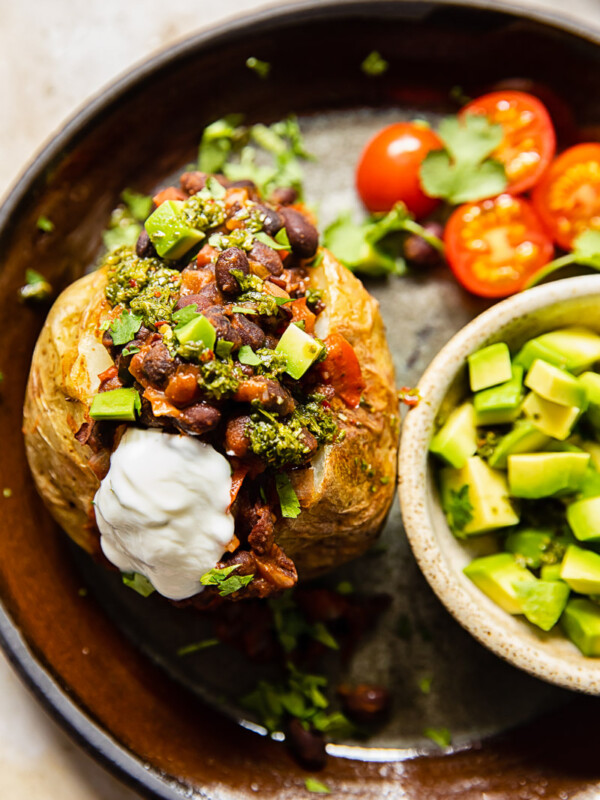 Plate with jacket potato and toppings
