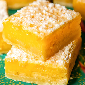 Close up shot of stacked lemon bars on a platter