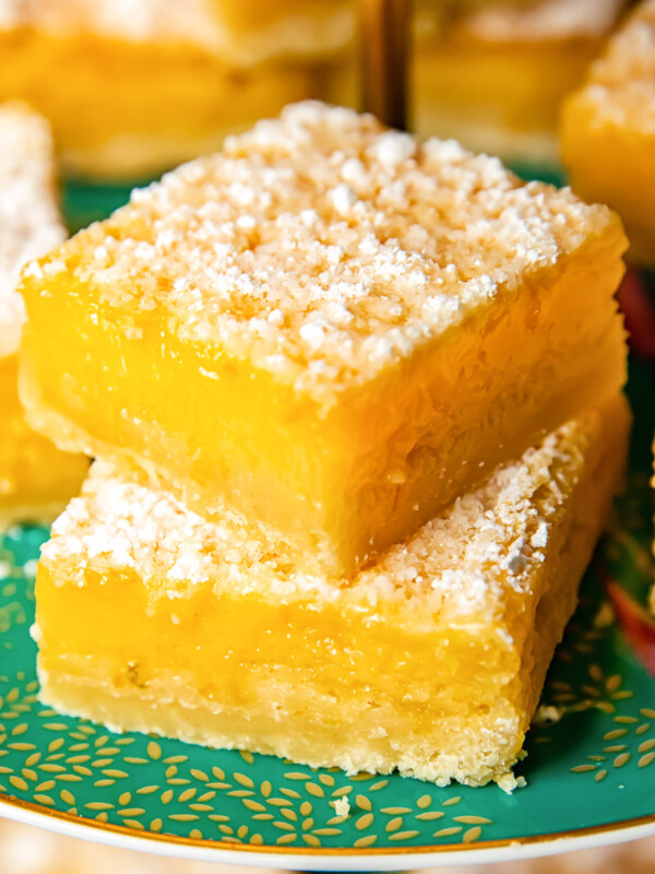 Close up shot of stacked lemon bars on a platter