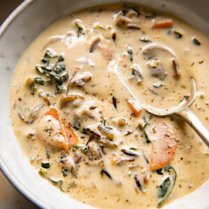Bowl with creamy soup and spoon