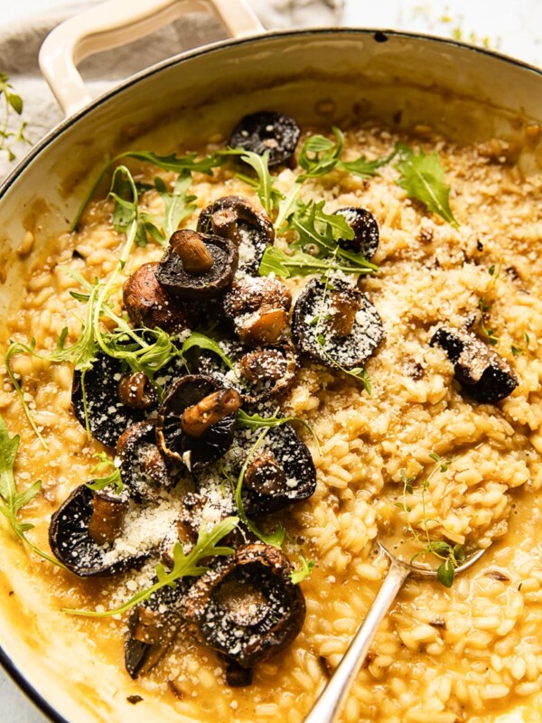 Overhead of roasted mushroom risotto with mushrooms on top