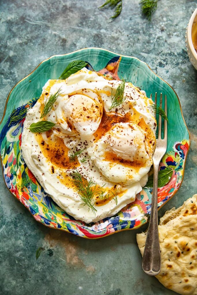 Plate of Turkish eggs with a fork