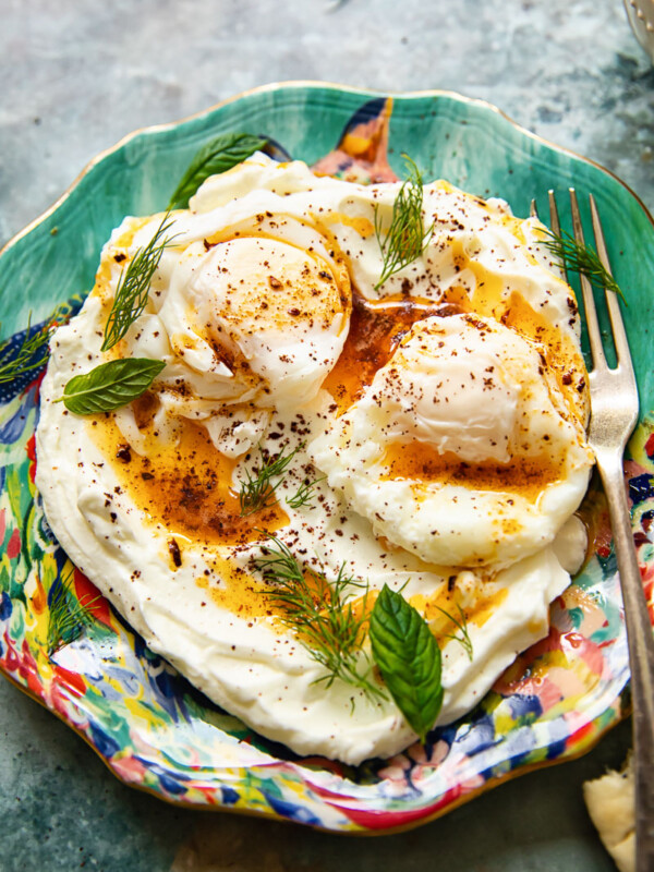 Colourful plate of Turkish eggs with a fork