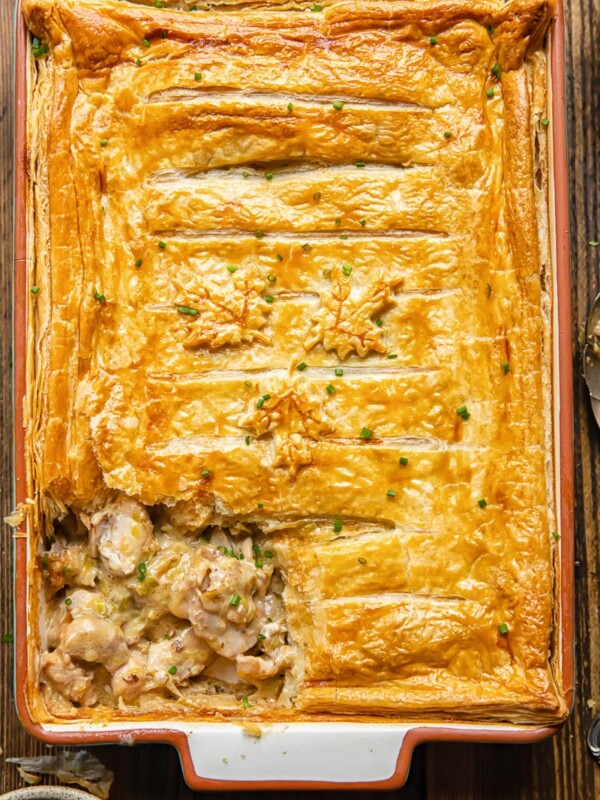 Top down shot of chicken and leak pie in a ractangular baking dish