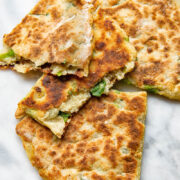 Close up shot of cut open pieces of irish potato farls stack on top each other