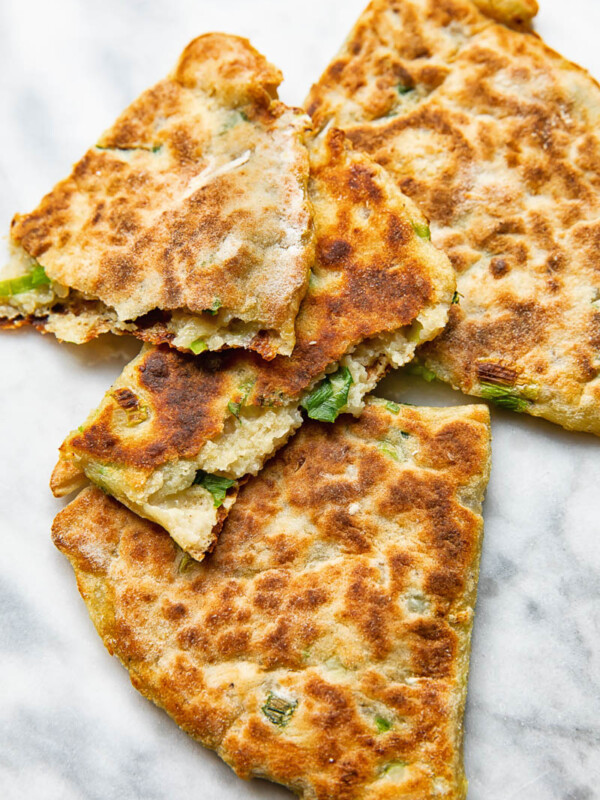 Close up shot of cut open pieces of irish potato farls stack on top each other