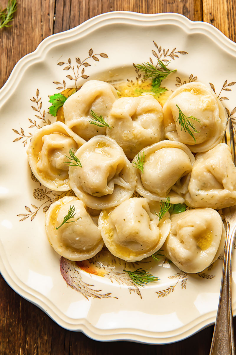 close up of pelmeni dumplings on a plate