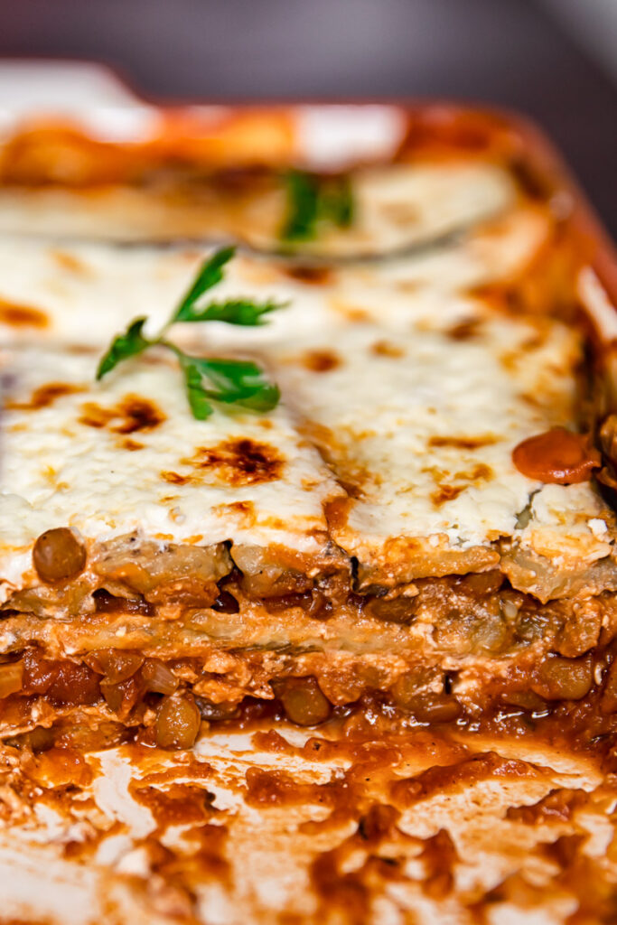 Side view of moussaka in a baking dish