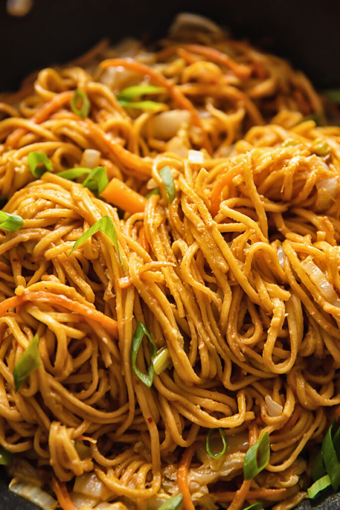 close up of spicy peanut noodles