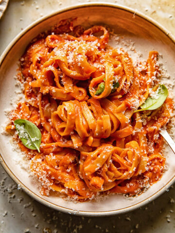 plate with tagliatelle in red sauce