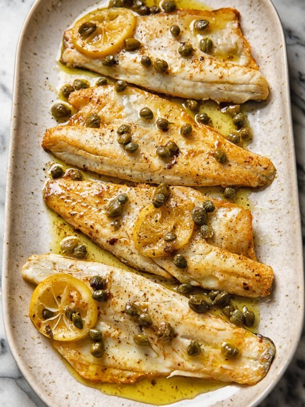 serving plate with four sea bass fillets