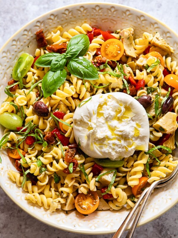 Pasta salad in a bowl with a spoon