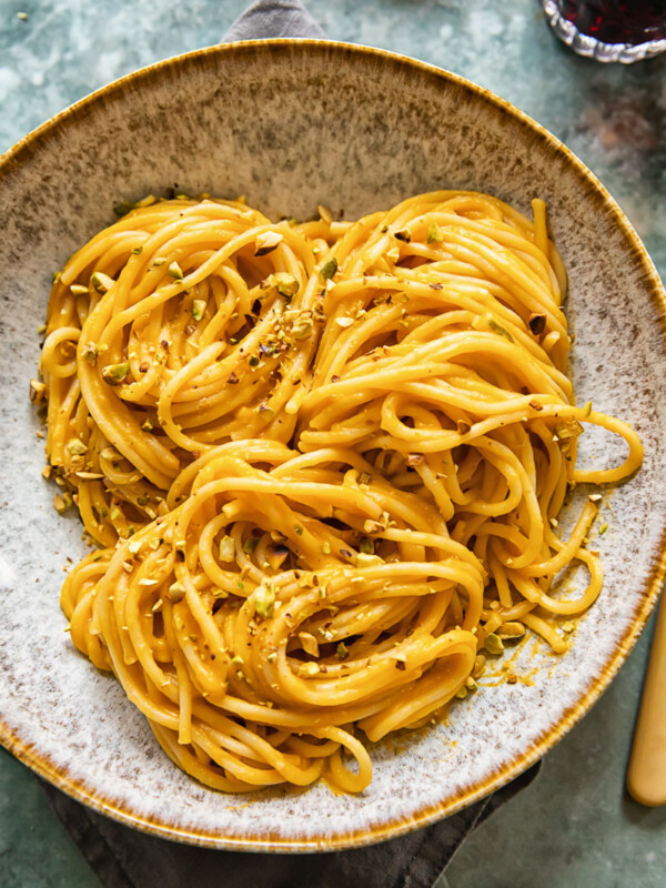 Bowl of roasted butternut squash pasta with pistachio crumb