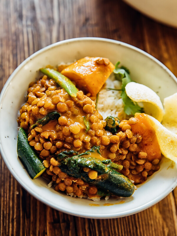 Bowl of sweet potato and lentil curry over rice