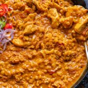 Top down shot of turkey and lentil curry in a wide pan