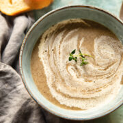 top down of vegan cream of mushroom soup in a bowl