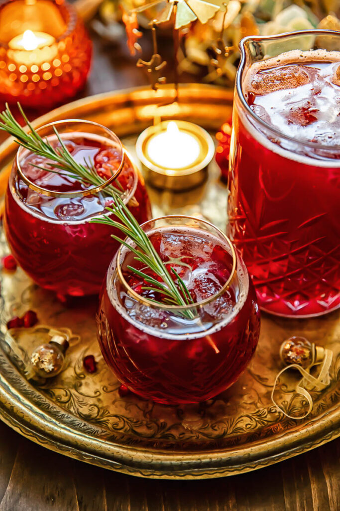 Top down shot of three christmas punch glasses on a tray