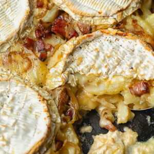 Top down shot of Tartiflette in a cast iron pan