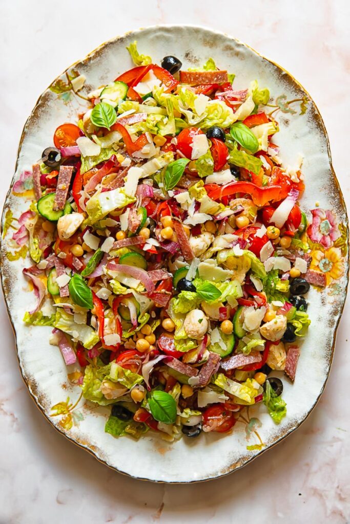 Top down shot of Italian chopped salad on a serving platter