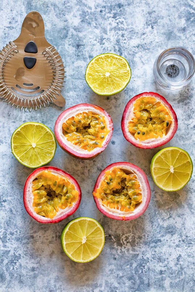 top down view of passion fruit and limes cross section