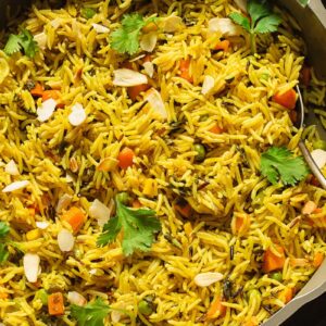 Wild rice pilaf in a large pan