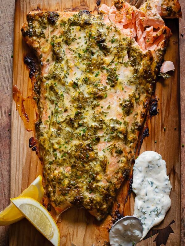 Top down shot of cedar plank salmon on a cutting board