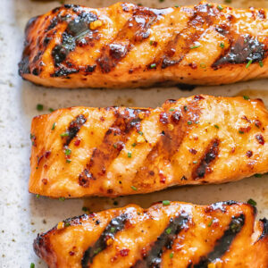 Close up shot of maple glazed salmon fillet slices