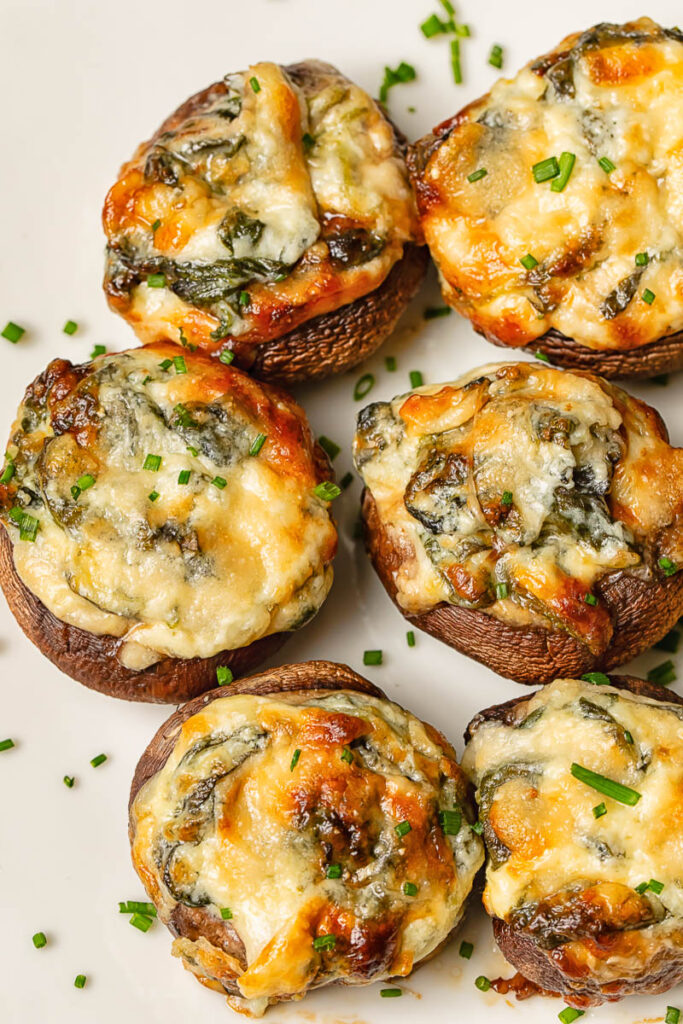 Close up of stuffed mushrooms with melted cheese