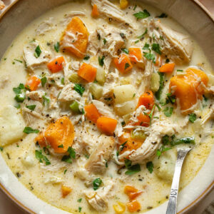 Top down shot of leftover turkey chowder in a small bowl