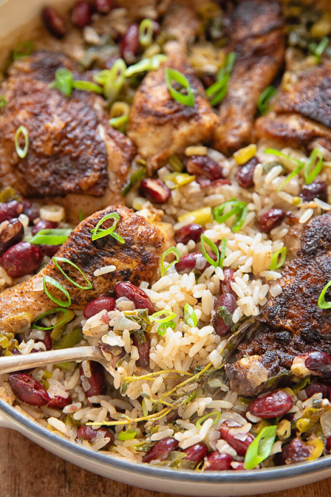 Close up shot of one pot Jamaican jerk chicken with rice