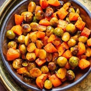 maple glazed sprouts and sweet potato in a large bowl