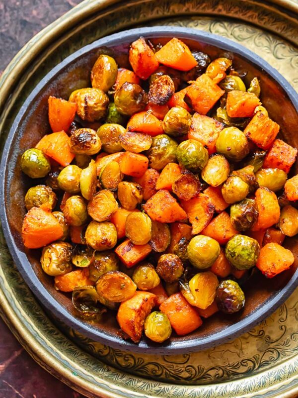 maple glazed sprouts and sweet potato in a large bowl