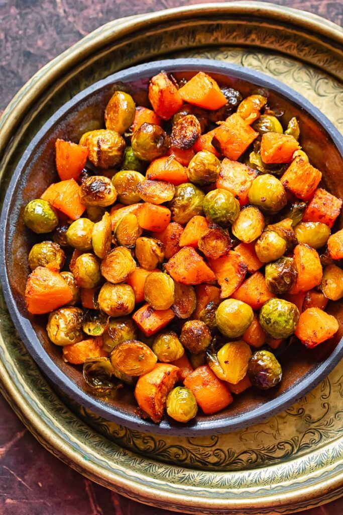 maple glazed sprouts and sweet potato in a large bowl