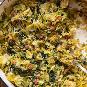 Brussels sprouts with pancetta and leaks in a large pan