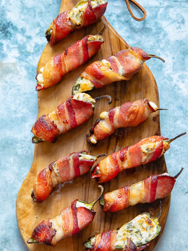 jalapeno poppers arranged on a cutting board