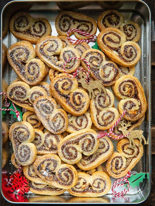 A storage container with palmiers and Christmas decorations