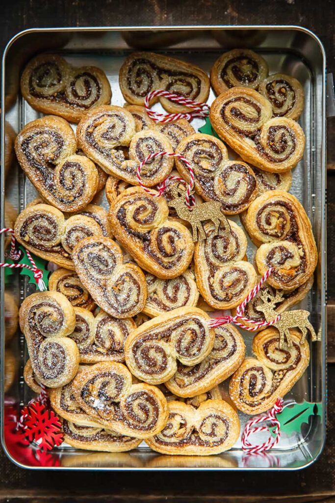 A storage container with palmiers and Christmas decorations