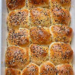Top down shot of dinner rolls in a baking dish