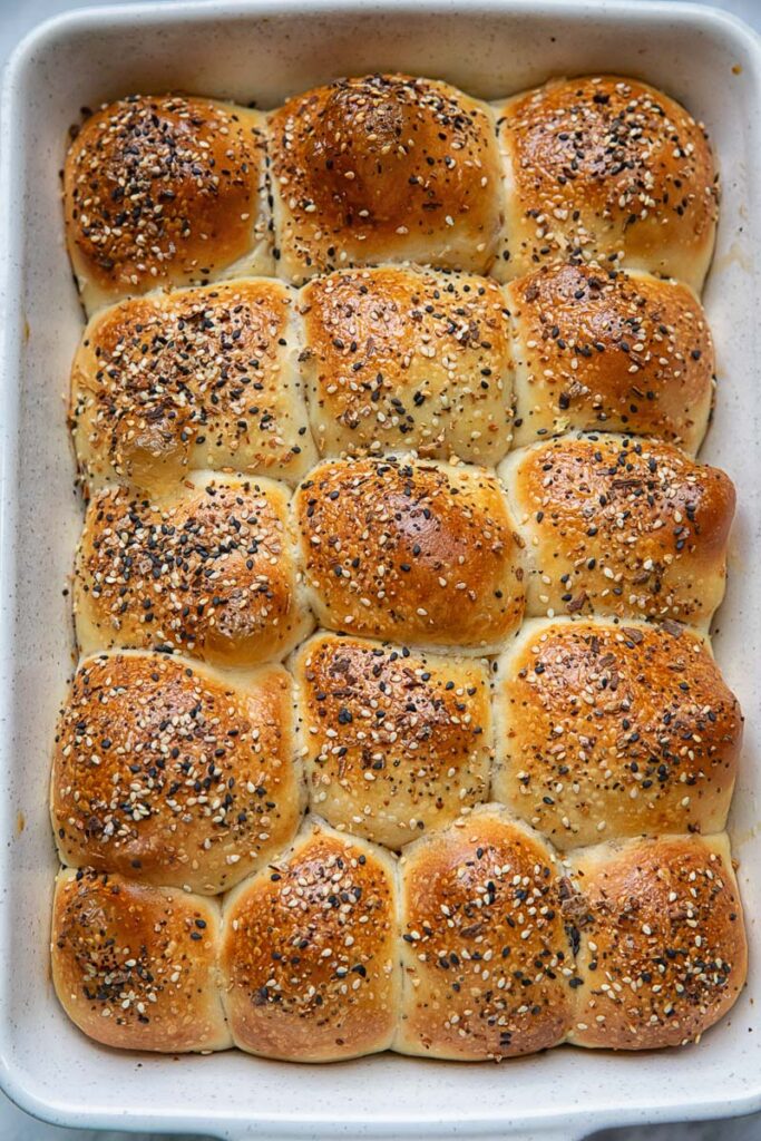 Top down shot of dinner rolls in a baking dish