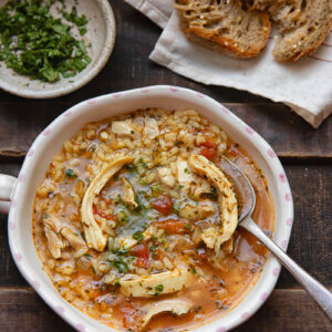 top down view of chicken and rice soup in a bowl