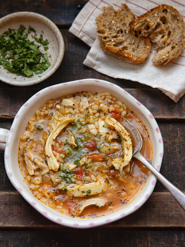top down view of chicken and rice soup in a bowl