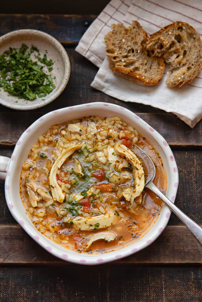top down view of chicken and rice soup in a bowl
