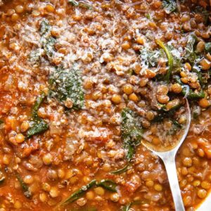 Top down of lentil and spinach soup in a large bowl
