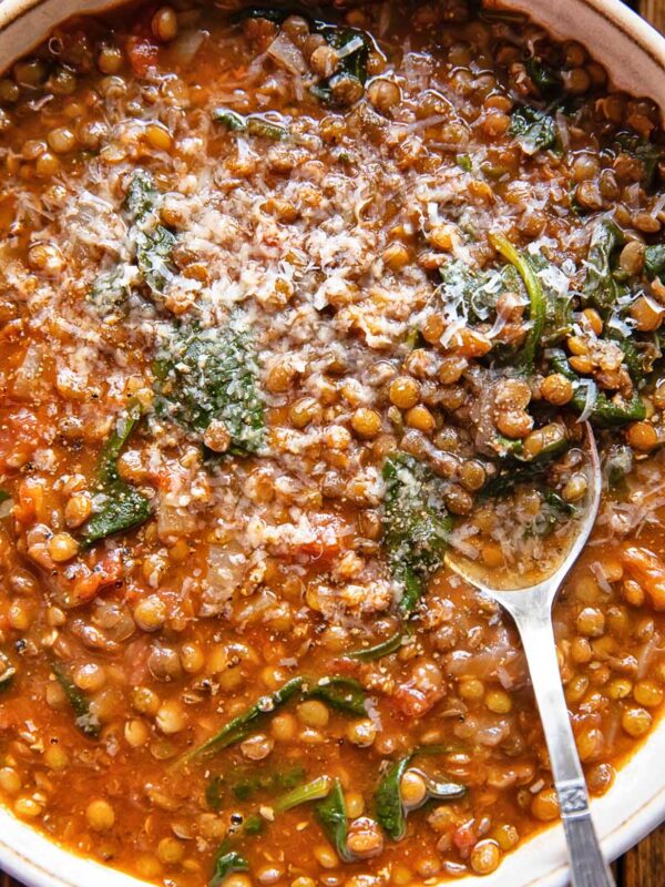 Top down of lentil and spinach soup in a large bowl