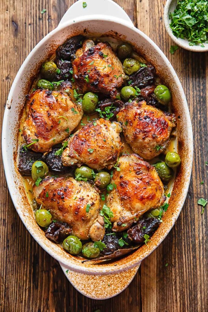 top down view of a casserole dish with chicken marbella