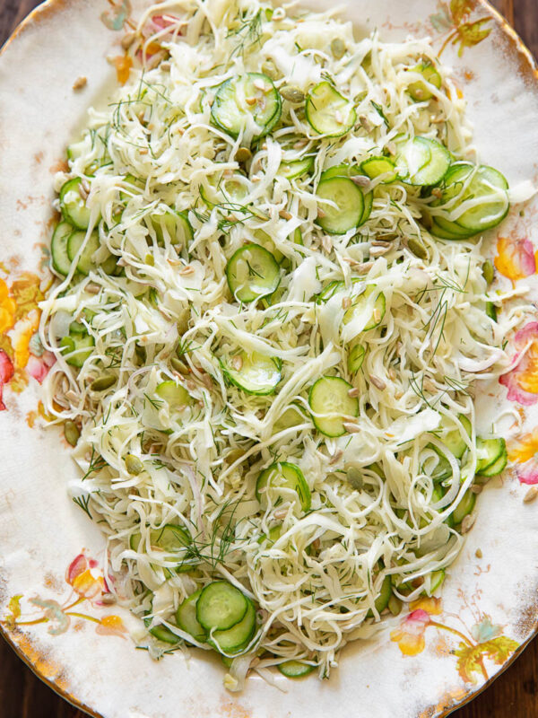 Top down shot of cabbage and cucumber slaw