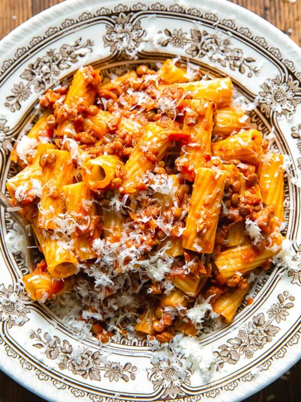Top down shot of lentil bolognese in a bowl of pasta