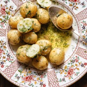Close up of a serving of garlic butter potatoes